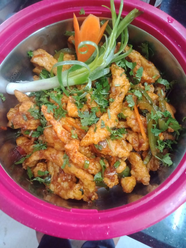 Tasty Crispy Chilli Lamb cooked by COOX chefs cooks during occasions parties events at home