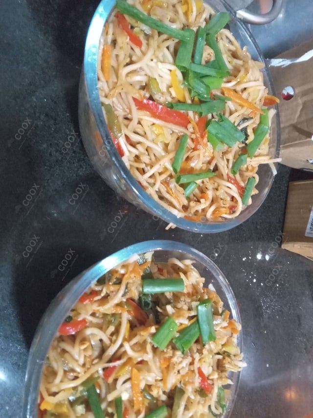 Tasty Chicken Chilli Garlic Noodles cooked by COOX chefs cooks during occasions parties events at home