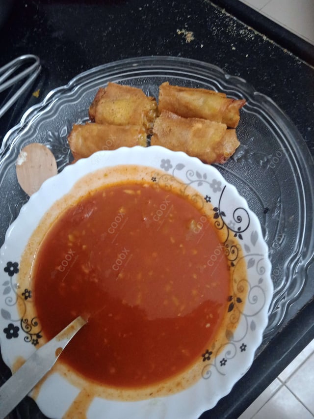 Delicious Veg Spring Rolls prepared by COOX