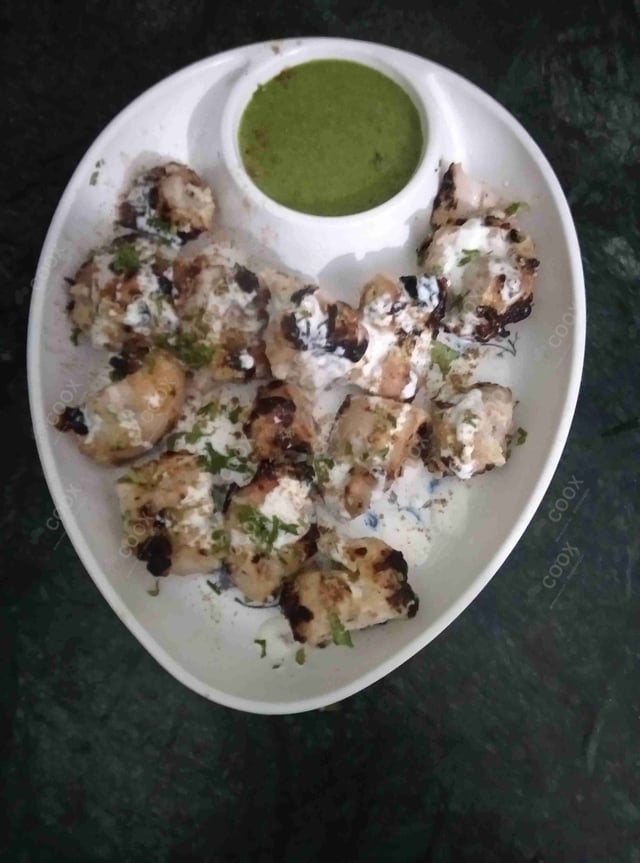 Tasty Murgh Malai Tikka cooked by COOX chefs cooks during occasions parties events at home