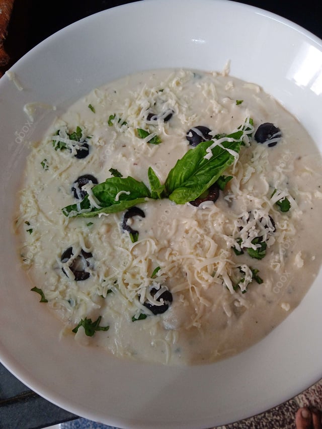 Delicious Ravioli in Pink Sauce prepared by COOX