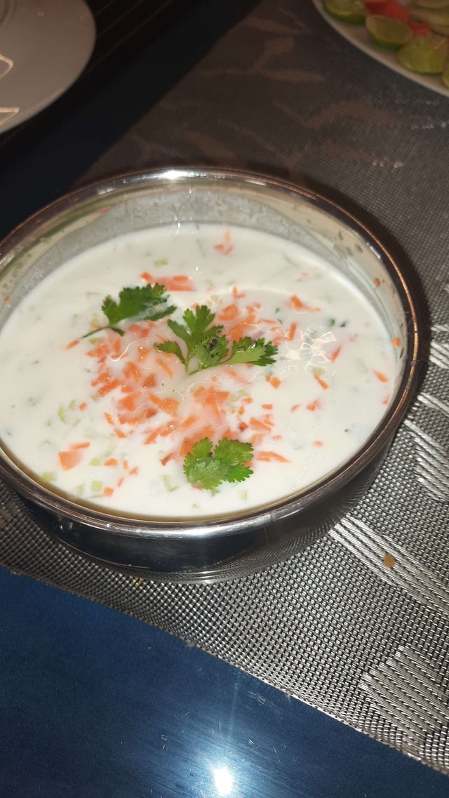 Tasty Cucumber Raita cooked by COOX chefs cooks during occasions parties events at home