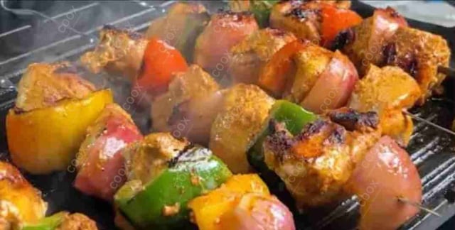 Tasty Chicken Tikka cooked by COOX chefs cooks during occasions parties events at home