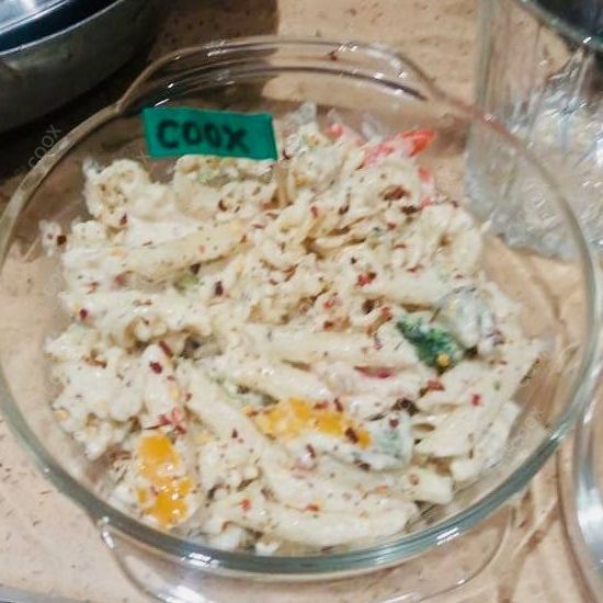 Tasty Chicken Pasta in White Sauce cooked by COOX chefs cooks during occasions parties events at home