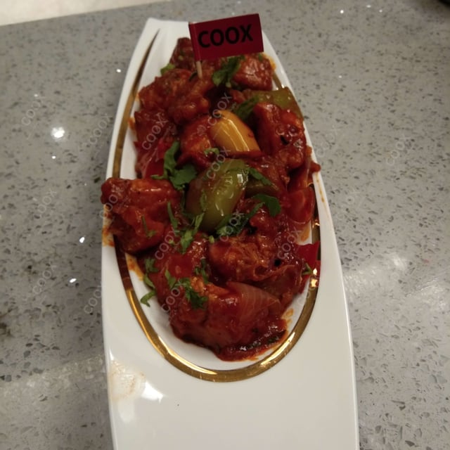 Tasty Chilli  Chicken cooked by COOX chefs cooks during occasions parties events at home