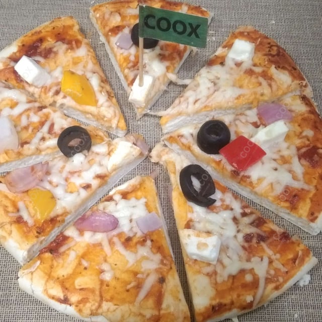 Tasty Veg Pizza cooked by COOX chefs cooks during occasions parties events at home