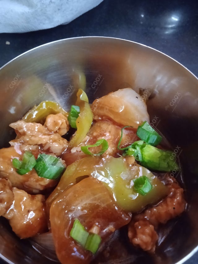 Tasty Chilli Chicken cooked by COOX chefs cooks during occasions parties events at home