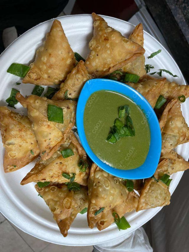 Tasty Mini Samosas cooked by COOX chefs cooks during occasions parties events at home