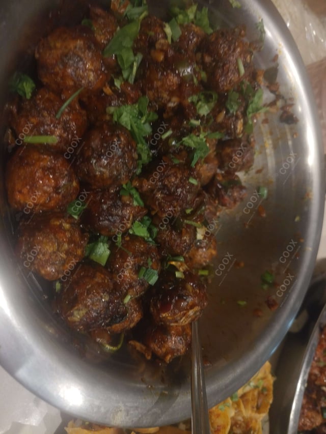 Delicious Veg Manchurian (Dry) prepared by COOX