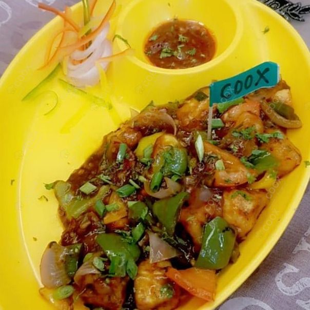Tasty Chilli Paneer (Dry) cooked by COOX chefs cooks during occasions parties events at home