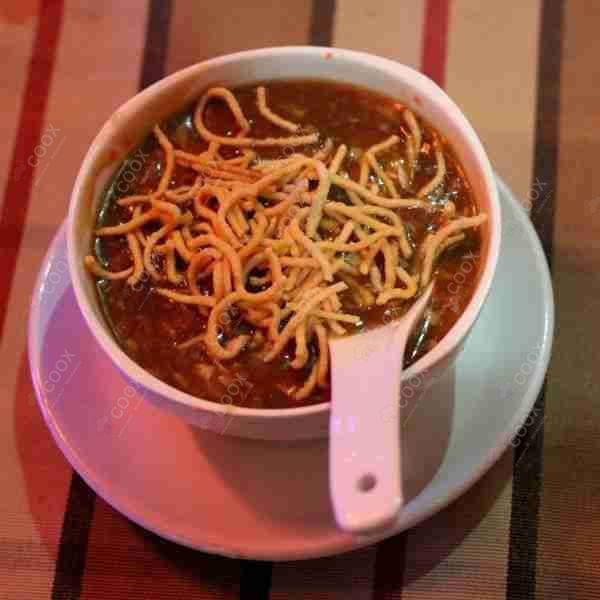 Delicious Vegetable Manchow Soup prepared by COOX