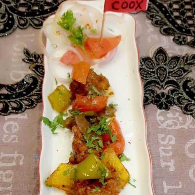 Tasty Chilli  Chicken cooked by COOX chefs cooks during occasions parties events at home