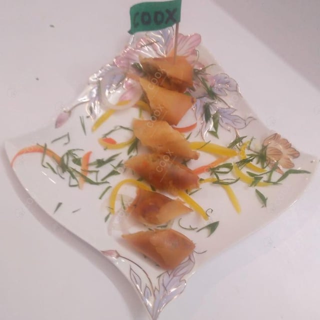 Tasty Veg Spring Rolls cooked by COOX chefs cooks during occasions parties events at home