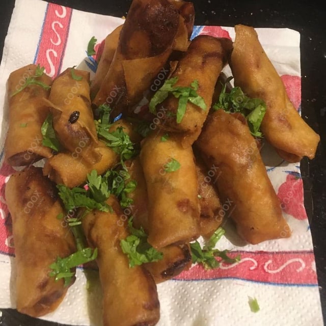 Tasty Veg Spring Rolls cooked by COOX chefs cooks during occasions parties events at home