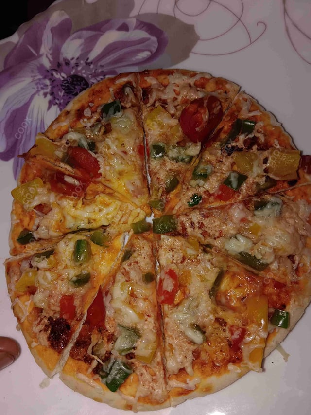 Tasty Margherita Pizza cooked by COOX chefs cooks during occasions parties events at home