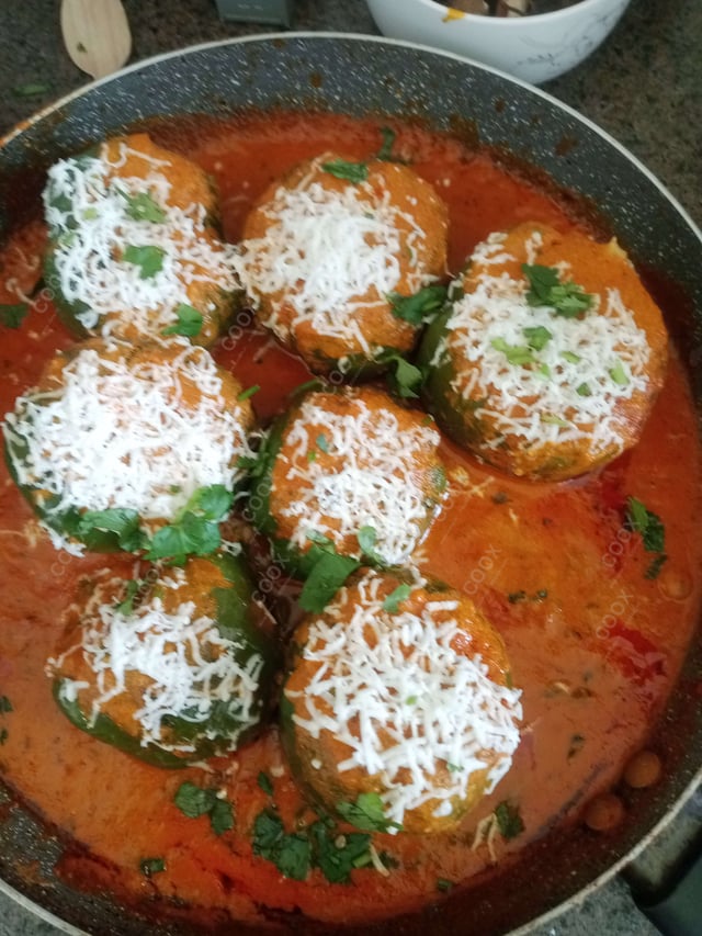 Delicious Bharwa Shimla Mirch prepared by COOX