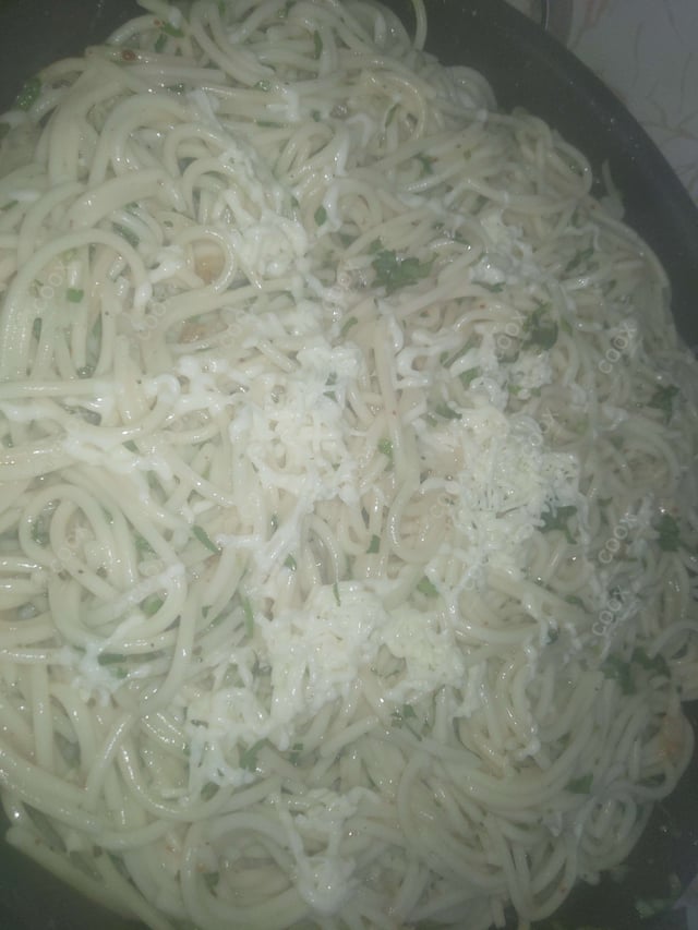 Tasty Spaghetti Aglio e Olio cooked by COOX chefs cooks during occasions parties events at home