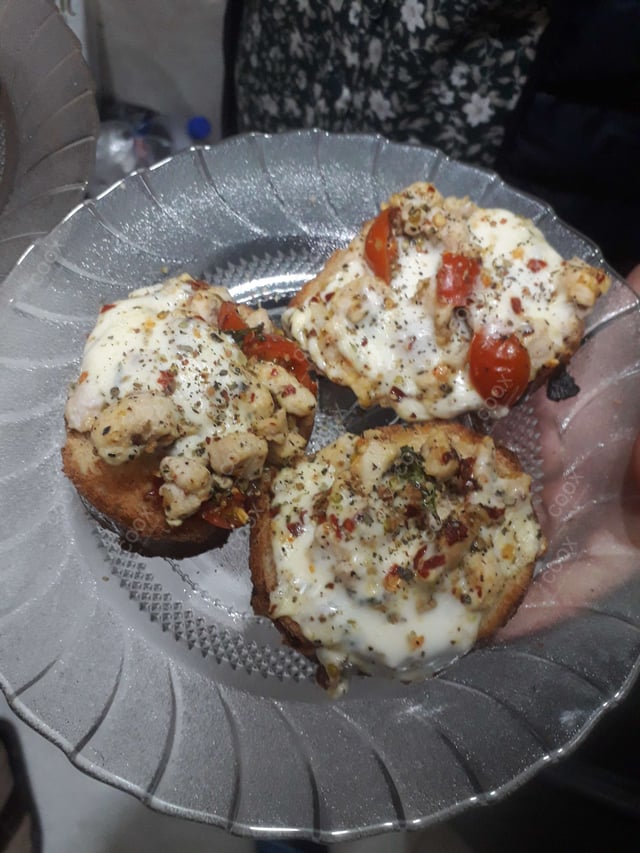 Tasty Chicken Bruschetta cooked by COOX chefs cooks during occasions parties events at home