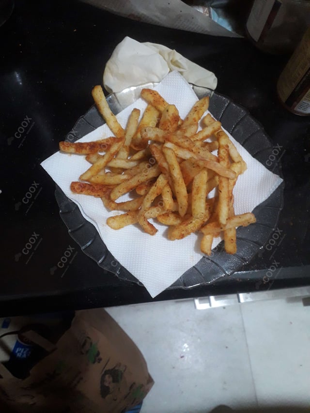 Tasty Peri Peri Fries cooked by COOX chefs cooks during occasions parties events at home