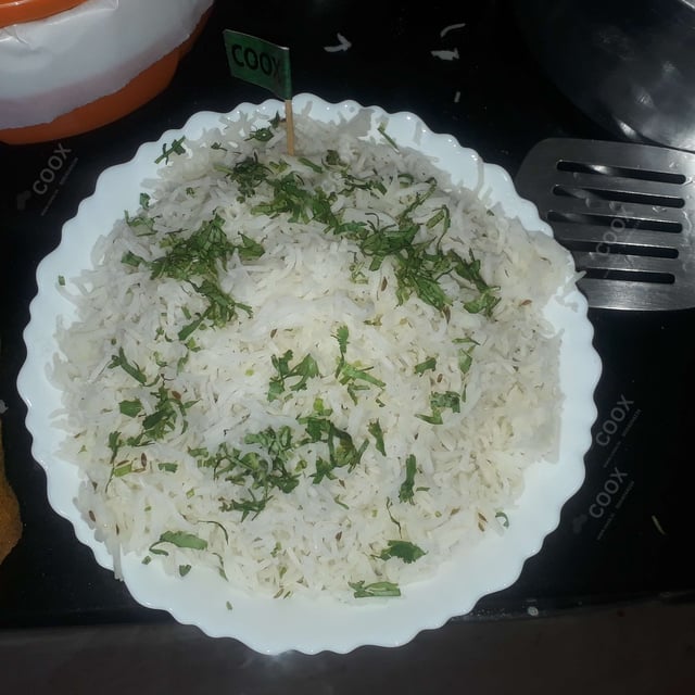 Tasty Jeera Rice cooked by COOX chefs cooks during occasions parties events at home