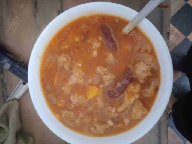 Tasty Chicken in Schezwan Sauce cooked by COOX chefs cooks during occasions parties events at home