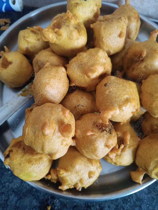 Tasty Aloo Bonda cooked by COOX chefs cooks during occasions parties events at home