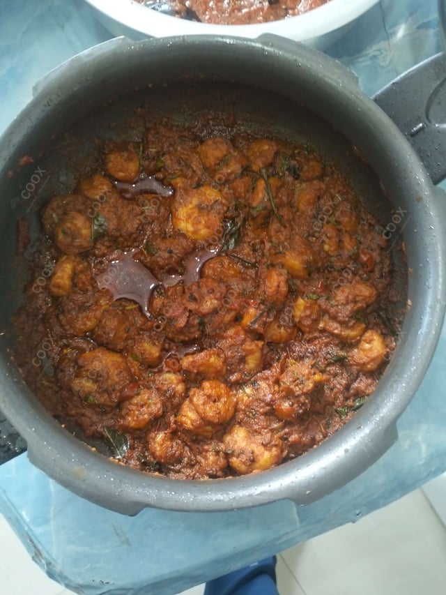 Tasty Prawn Curry cooked by COOX chefs cooks during occasions parties events at home
