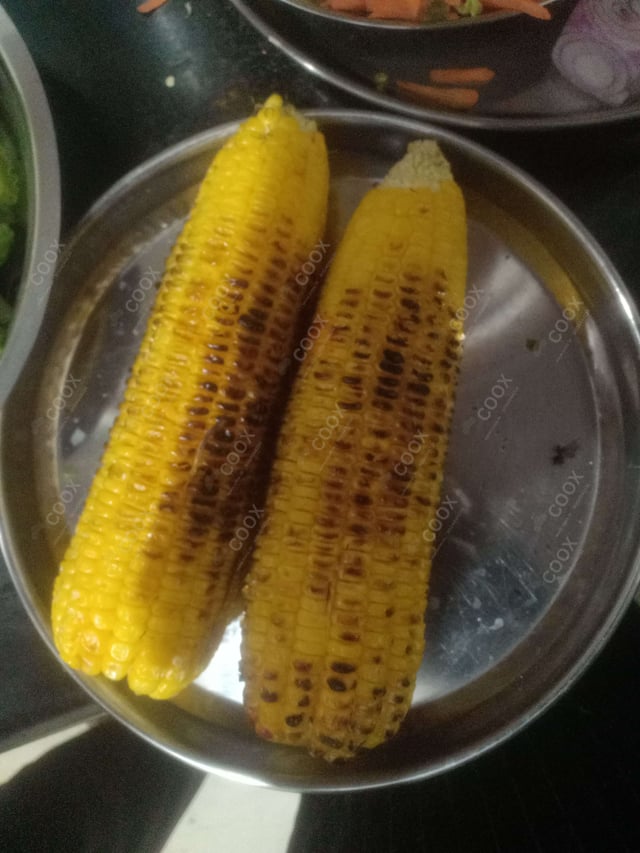 Tasty Grilled Corn cooked by COOX chefs cooks during occasions parties events at home