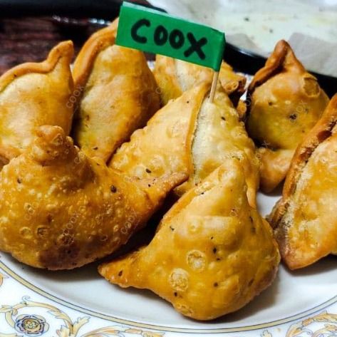 Tasty Mini Samosas cooked by COOX chefs cooks during occasions parties events at home