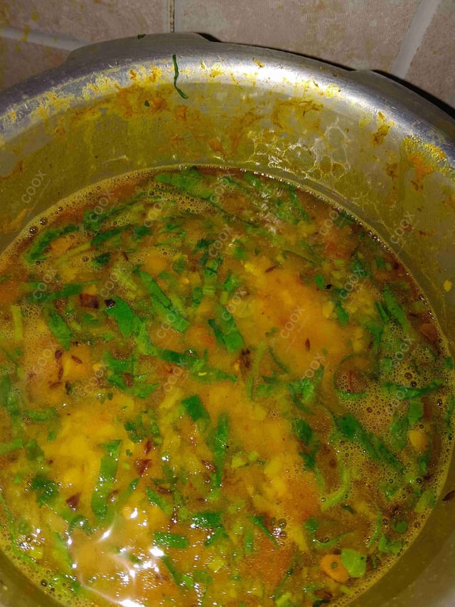 Tasty Palak Dal cooked by COOX chefs cooks during occasions parties events at home