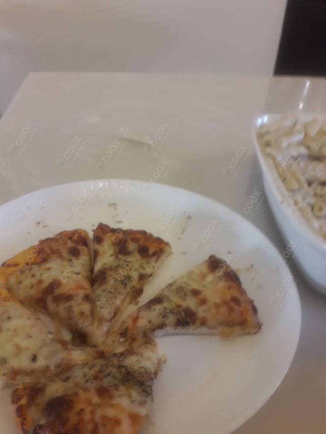 Tasty Margherita Pizza cooked by COOX chefs cooks during occasions parties events at home