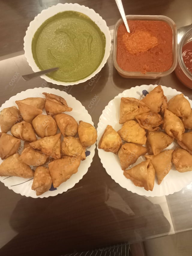 Tasty Mini Samosas cooked by COOX chefs cooks during occasions parties events at home
