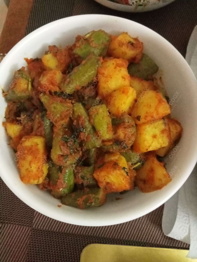 Tasty Aloo Parwal cooked by COOX chefs cooks during occasions parties events at home