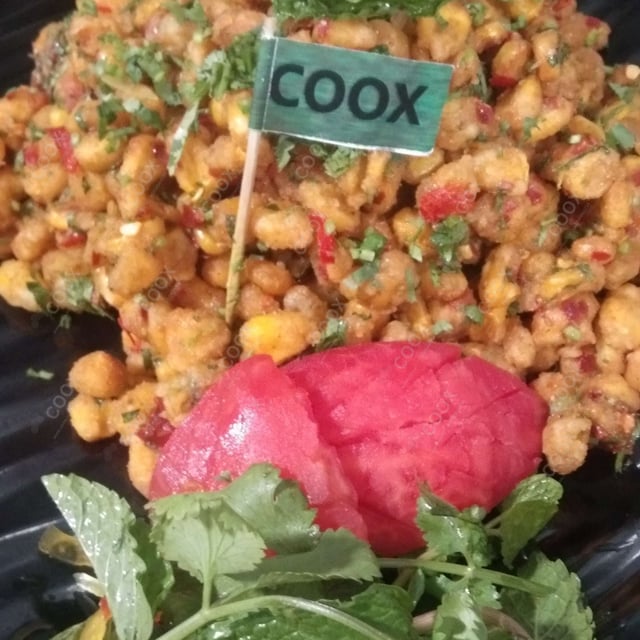 Tasty Corn Chaat cooked by COOX chefs cooks during occasions parties events at home