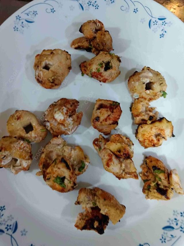 Delicious Murgh Malai Tikka prepared by COOX
