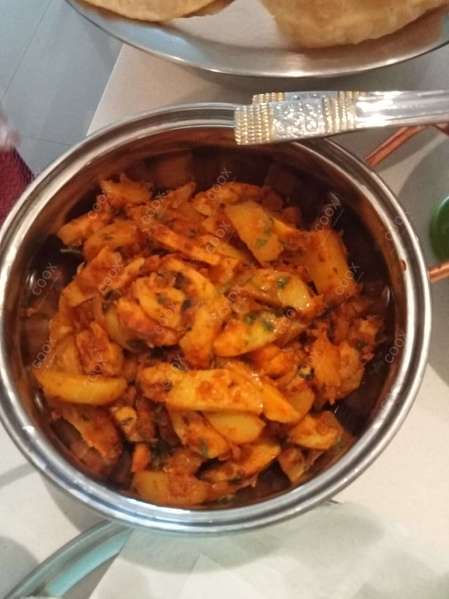 Tasty Arbi (Dry) cooked by COOX chefs cooks during occasions parties events at home