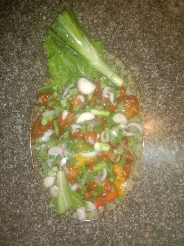 Tasty Chilli Chicken cooked by COOX chefs cooks during occasions parties events at home