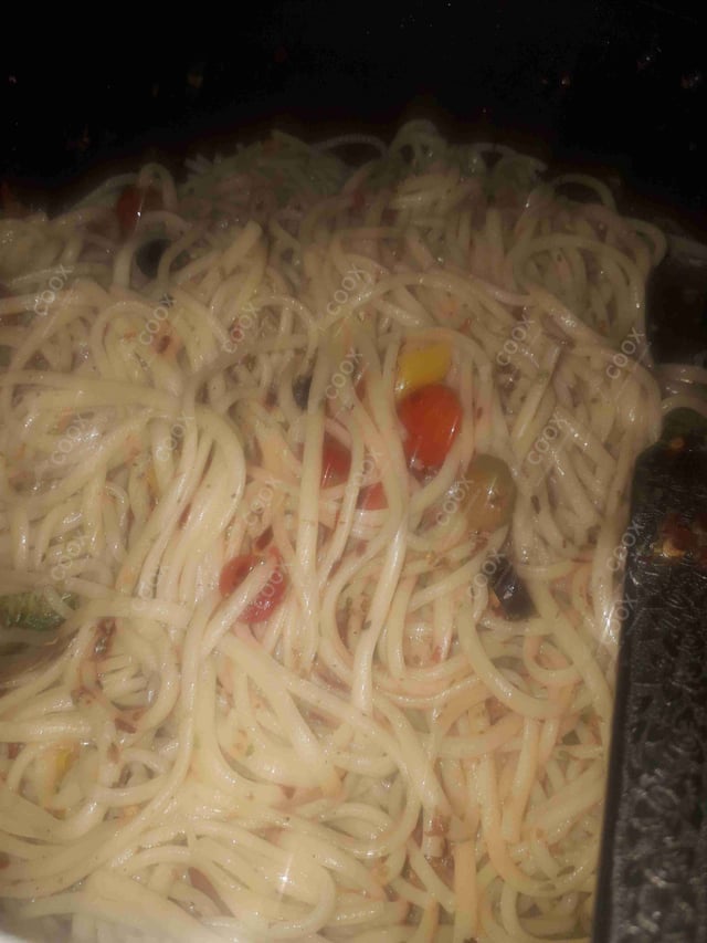 Tasty Spaghetti Aglio e Olio cooked by COOX chefs cooks during occasions parties events at home
