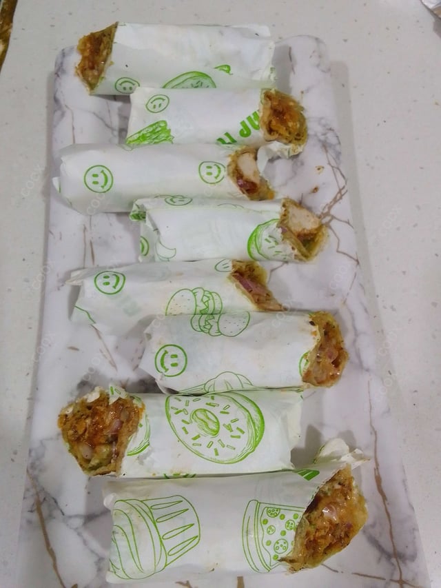 Tasty Chicken Kathi Rolls cooked by COOX chefs cooks during occasions parties events at home