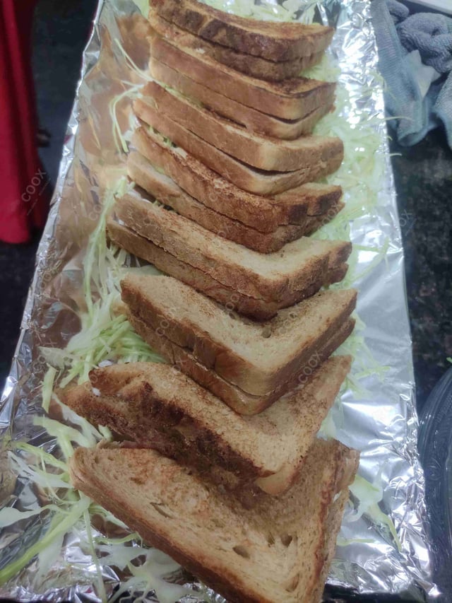 Tasty Grilled Veg Sandwiches cooked by COOX chefs cooks during occasions parties events at home