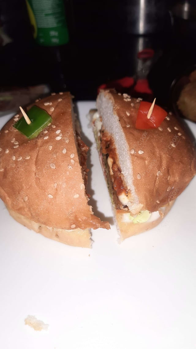 Tasty Mini Veg Burgers cooked by COOX chefs cooks during occasions parties events at home