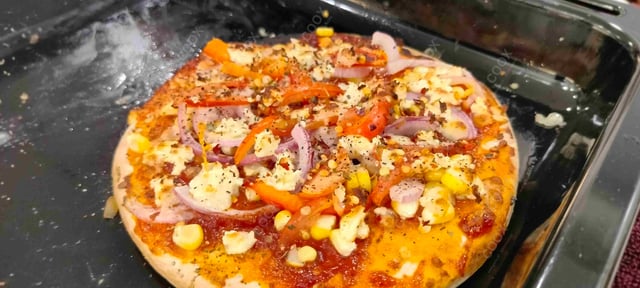 Tasty Margherita Pizza cooked by COOX chefs cooks during occasions parties events at home