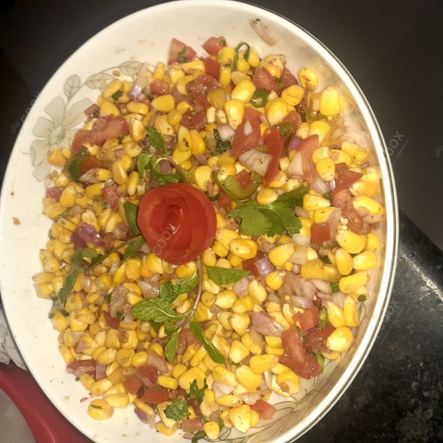 Tasty Corn Chaat cooked by COOX chefs cooks during occasions parties events at home