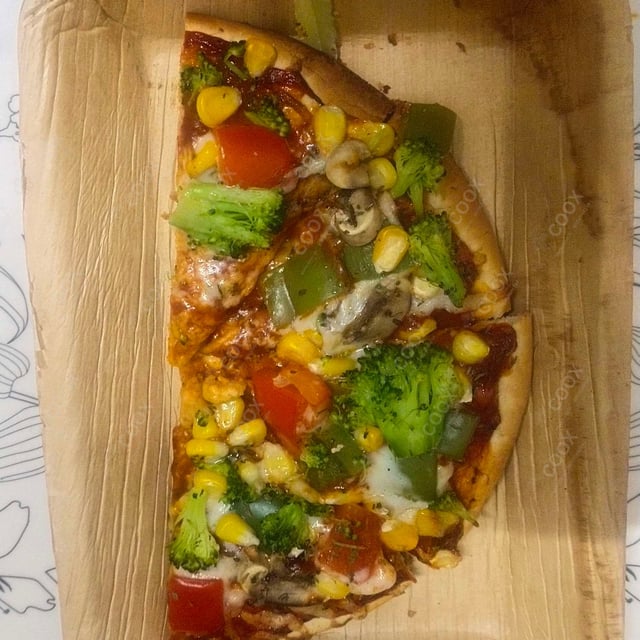 Tasty Veg Pizza cooked by COOX chefs cooks during occasions parties events at home