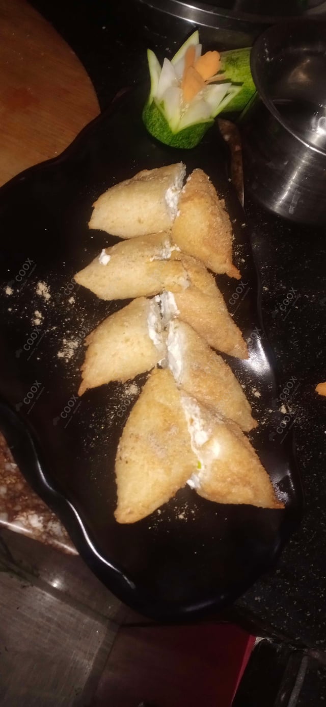 Delicious Dahi ke Sholey prepared by COOX