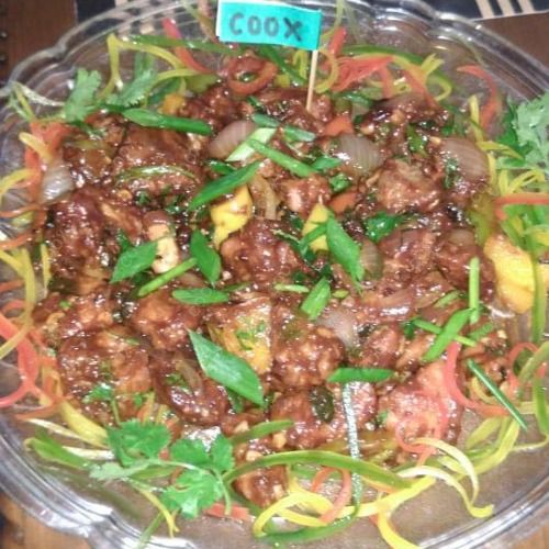 Tasty Chilli  Chicken cooked by COOX chefs cooks during occasions parties events at home