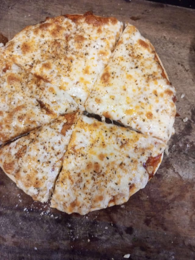 Tasty Margherita Pizza cooked by COOX chefs cooks during occasions parties events at home