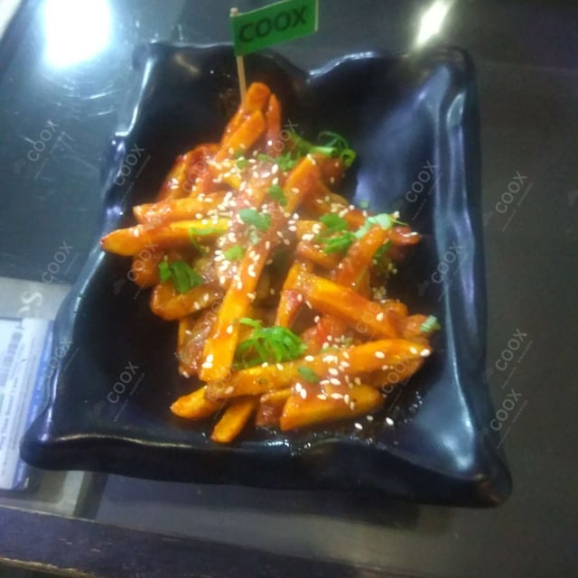 Tasty Honey Chilli Potato cooked by COOX chefs cooks during occasions parties events at home