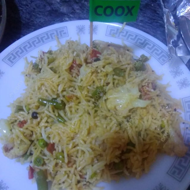 Tasty Veg Biryani cooked by COOX chefs cooks during occasions parties events at home