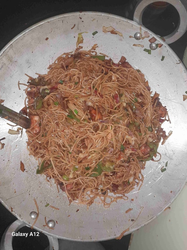 Tasty Chicken Chilli Garlic Noodles cooked by COOX chefs cooks during occasions parties events at home